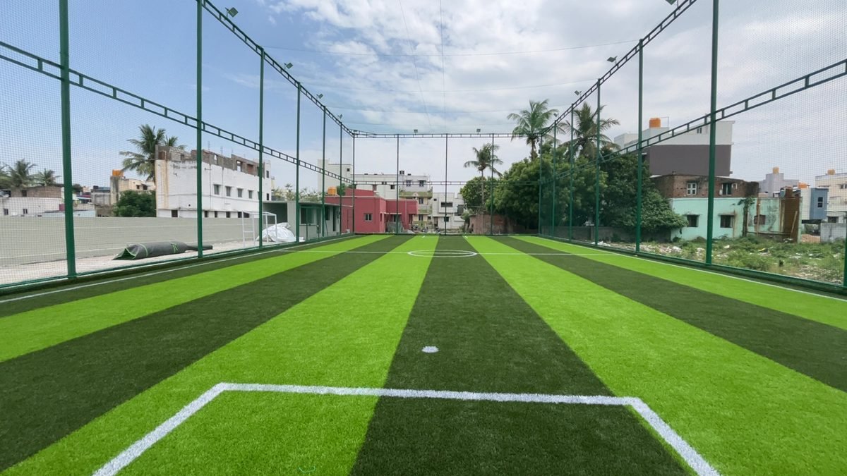Football turf at Biinnggo 5rings Turf, Mel Ayanambakkam, with the open area beside it